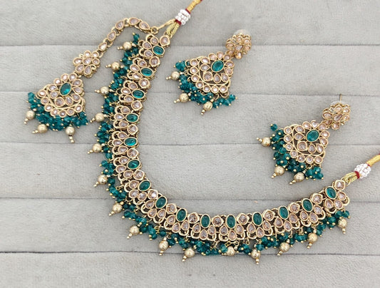 Antique Gold-Tone Stone Studded Jewelry Set with Maangtikka