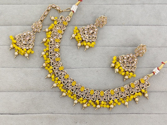 Antique Gold-Tone Stone Studded Jewelry Set with Maangtikka