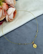 Invisible Wire Lakshmi Coin Pendant Necklace with Gold Bead Accents