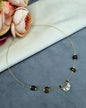 Invisible Wire Crescent Pendant Necklace with Black Bead Accents